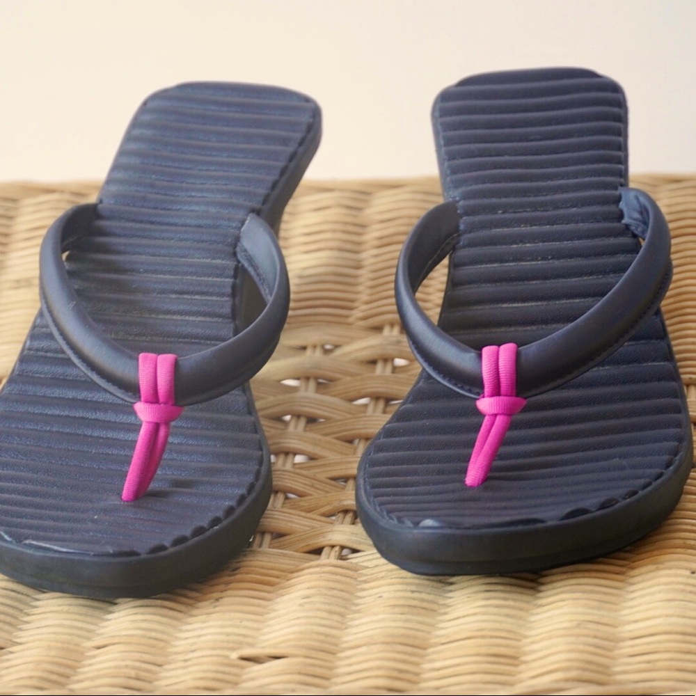 Bargain price. Crocs hot pink and black sandals. Size 10. EUC. Very comfortable